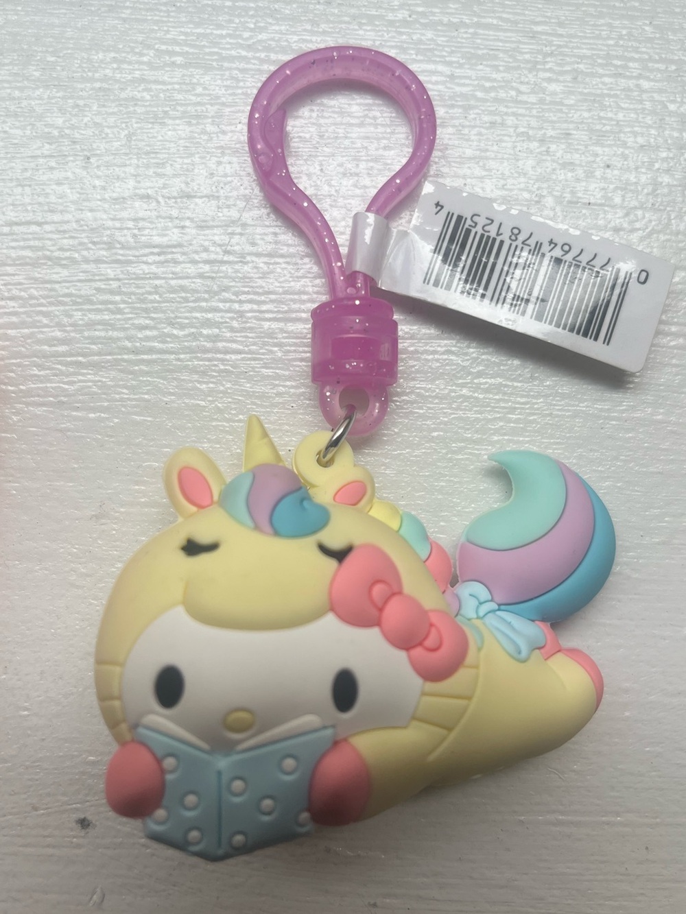 Hello Kitty Unicorn reading Keychain with Pink Clip